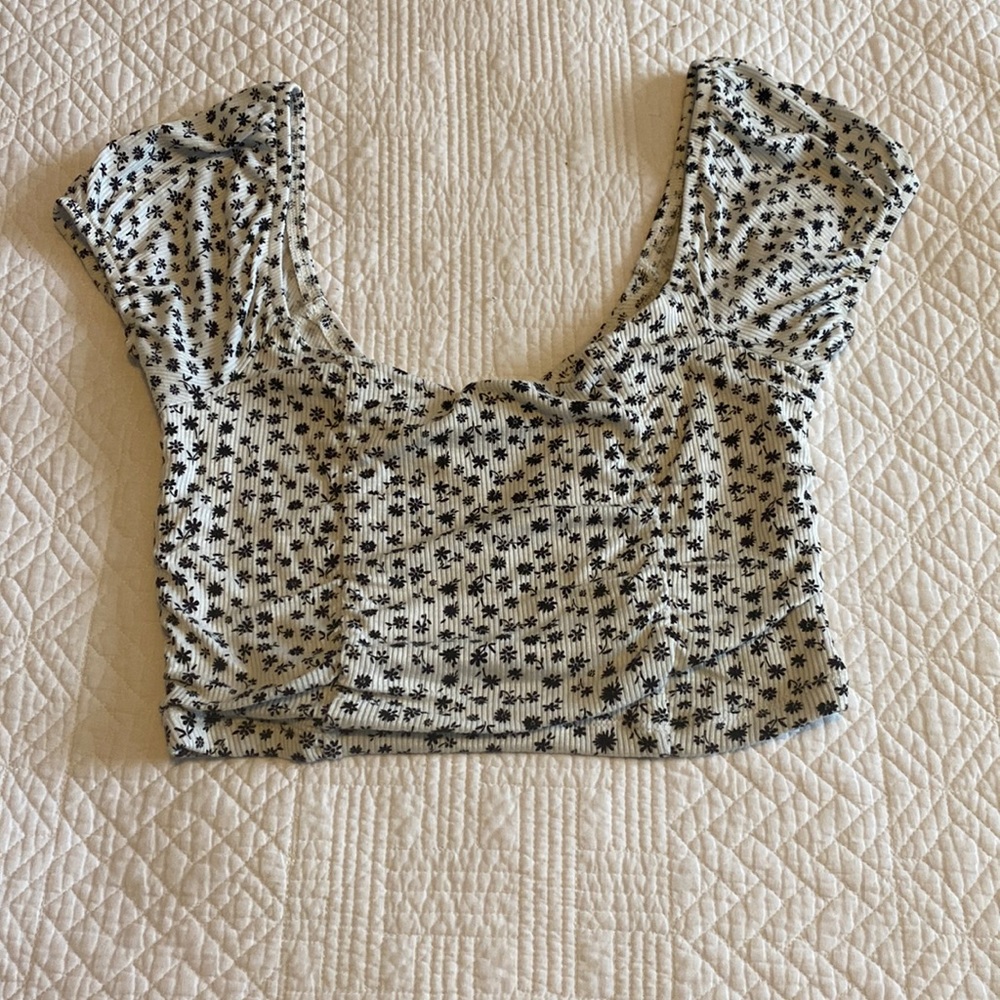 Womens crop top with shoulder sleeves.